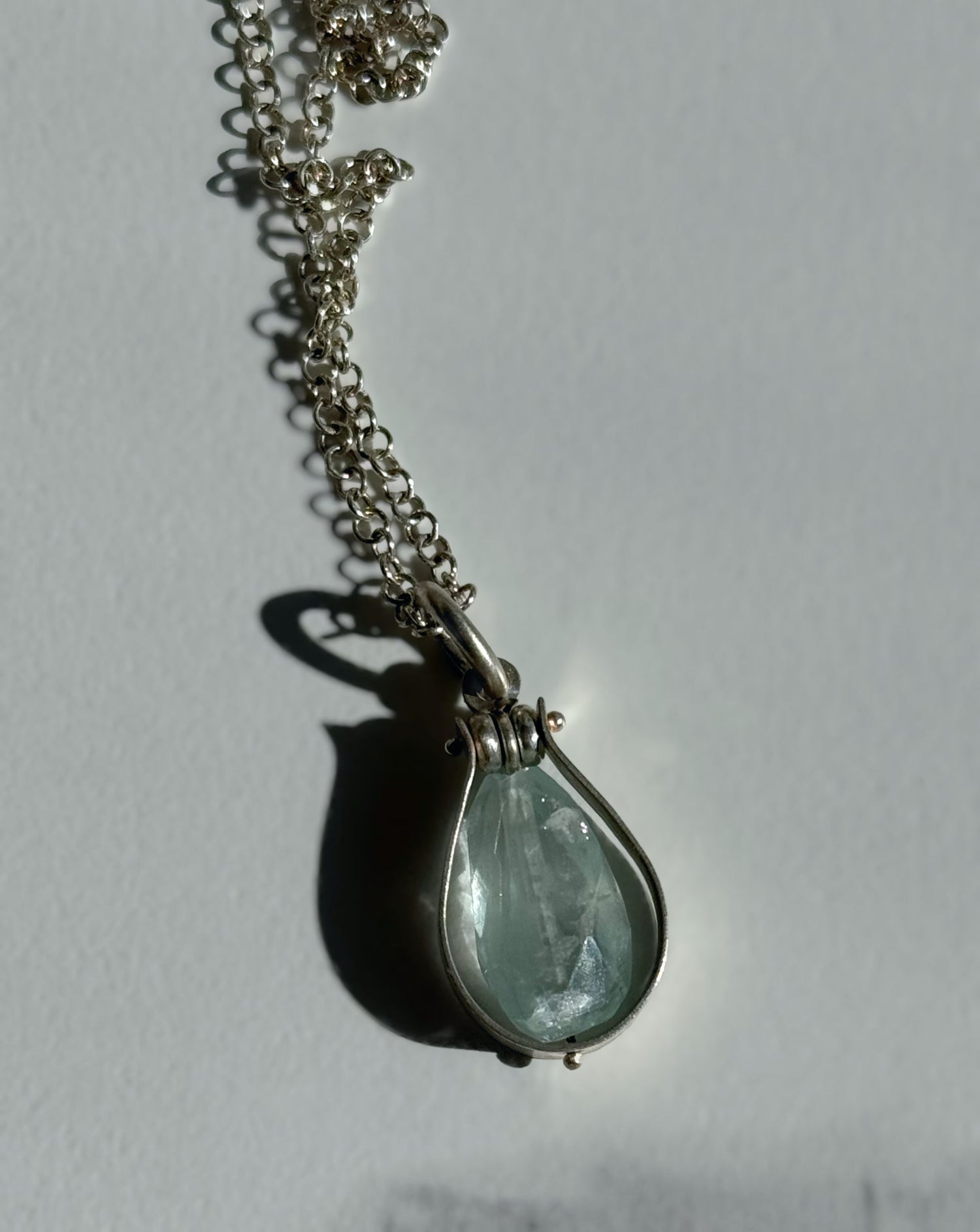 Fig Drop Pendant Necklace featuring a unique teardrop gemstone on a silver chain from The W Gallery