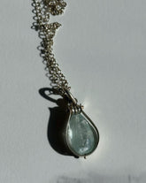 Fig Drop Pendant Necklace featuring a unique teardrop gemstone on a silver chain from The W Gallery