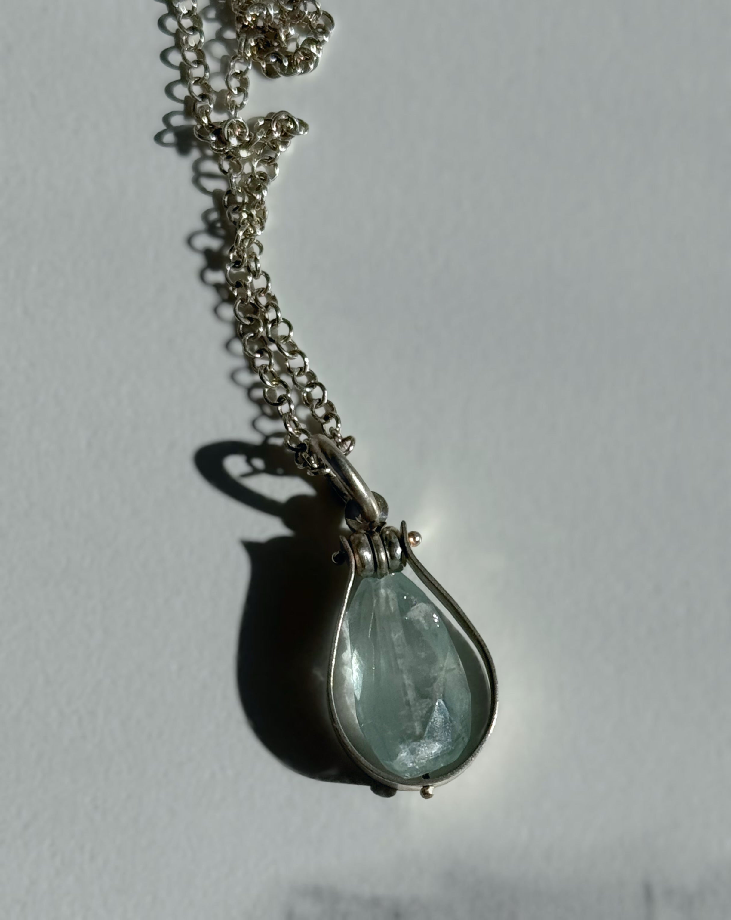 Fig Drop Pendant Necklace featuring a unique teardrop gemstone on a silver chain from The W Gallery