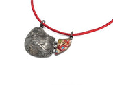 Mosaic double face jewelry pendant by Katerina Anastasiou on a red cord necklace