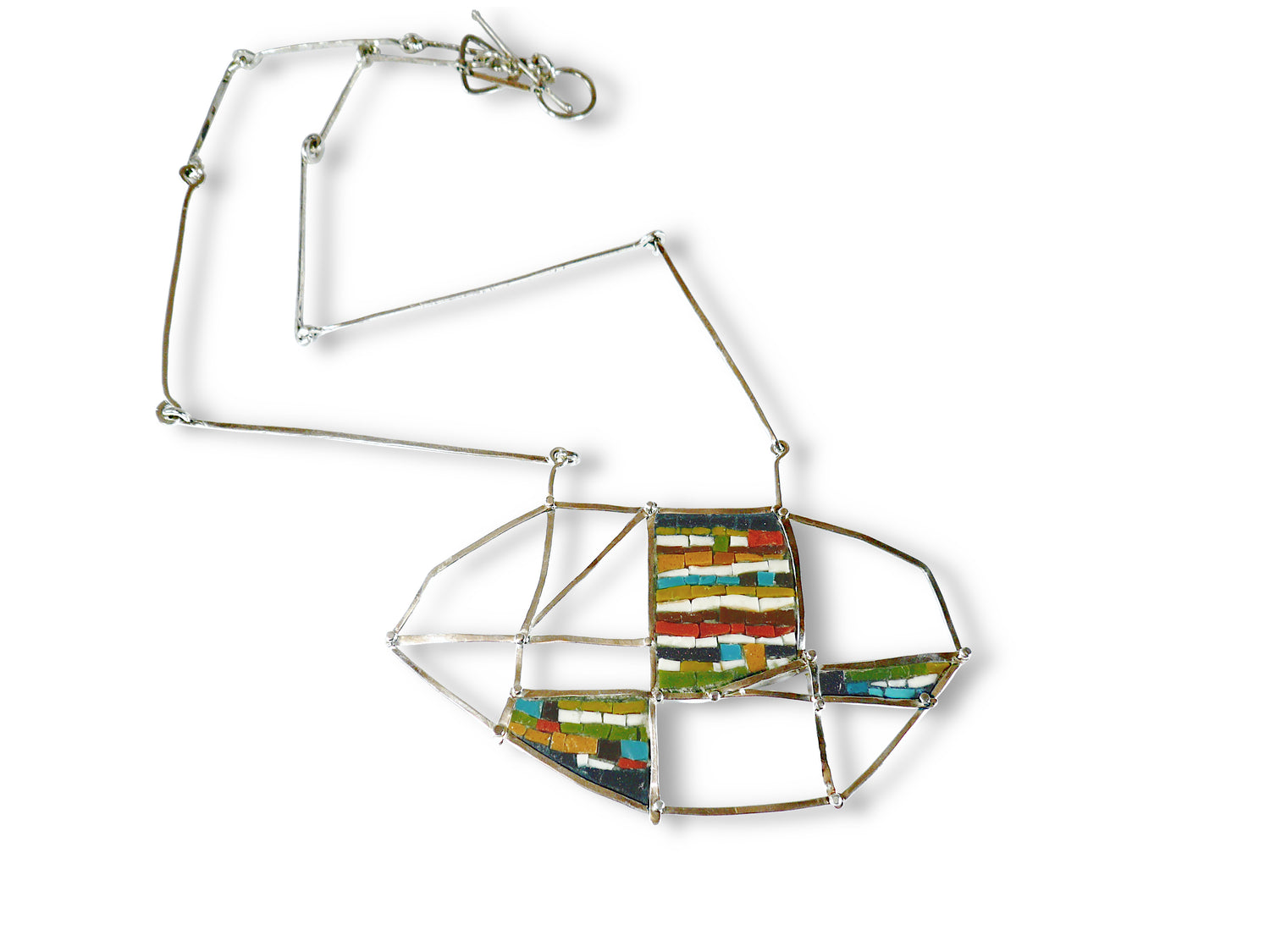 Mosaic Necklace featuring colorful geometric designs on a silver chain from The W Gallery