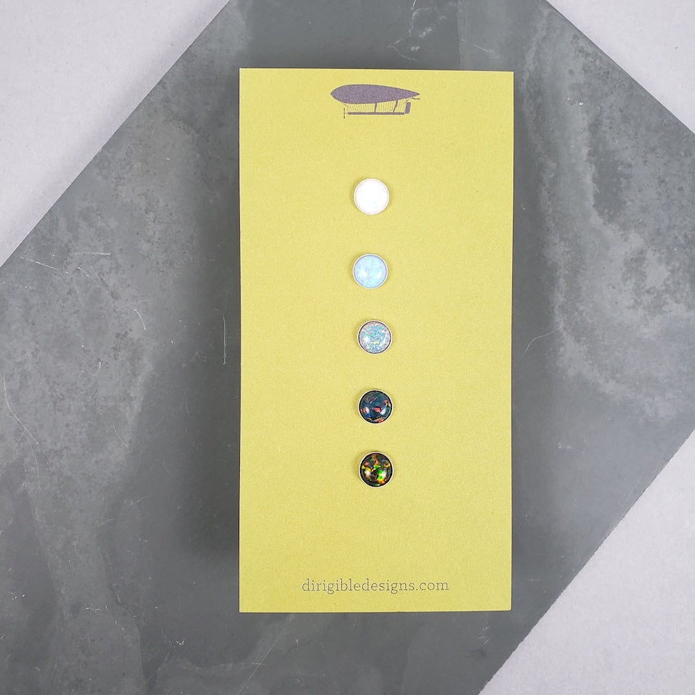 Unmatching Stone Stud Sets