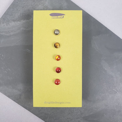 Unmatching Stone Stud Sets